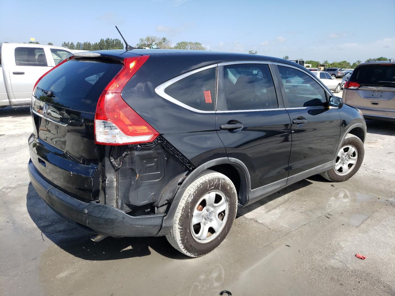 Photo 4 from auction – 2012 HONDA CR-V LX with VIN 5J6RM3H32CL019013