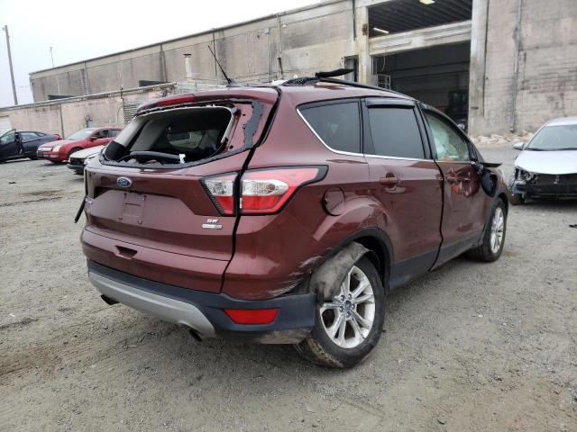 Photo 4 from auction – 2018 FORD ESCAPE SE with VIN 1FMCU9GDXJUC49815