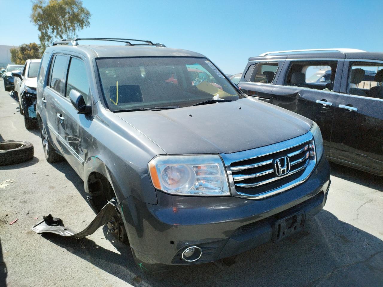 HONDA PILOT TOUR 2013 with VIN 5FNYF4H96DB008333 - Photo from auction