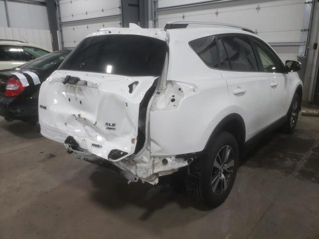 Photo 4 from auction – 2016 TOYOTA RAV4 XLE with VIN JTMRFREV0GD192568