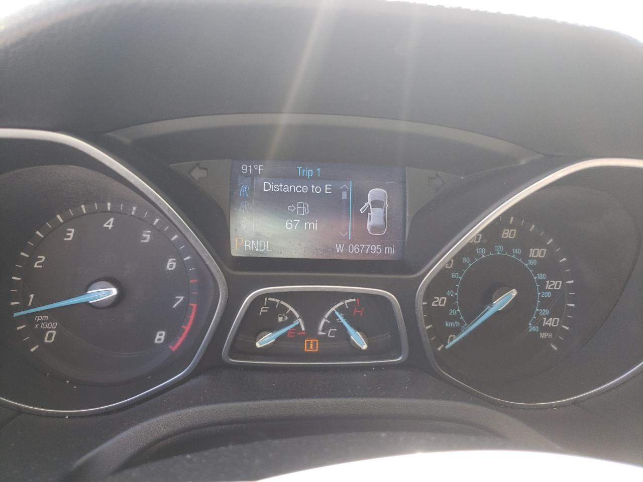 Photo 8 from auction – 2014 FORD FOCUS SE with VIN 1FADP3F23EL159579