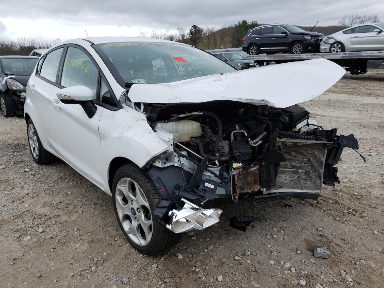 FORD FIESTA SES 2012 with VIN 3FADP4FJ6CM103659 - Photo from auction