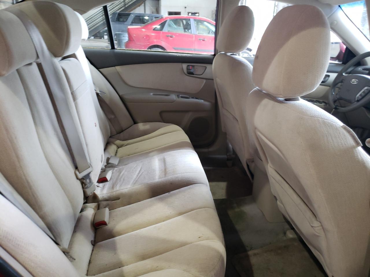 Photo 6 from auction – 2006 KIA OPTIMA LX with VIN KNAGE124165064868