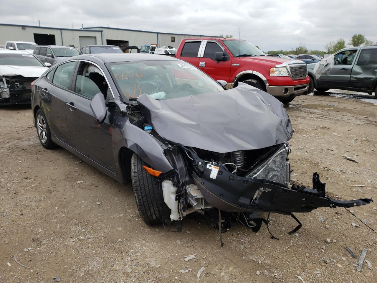 HONDA CIVIC LX 2018 with VIN 2HGFC2F5XJH572238 - Photo from auction