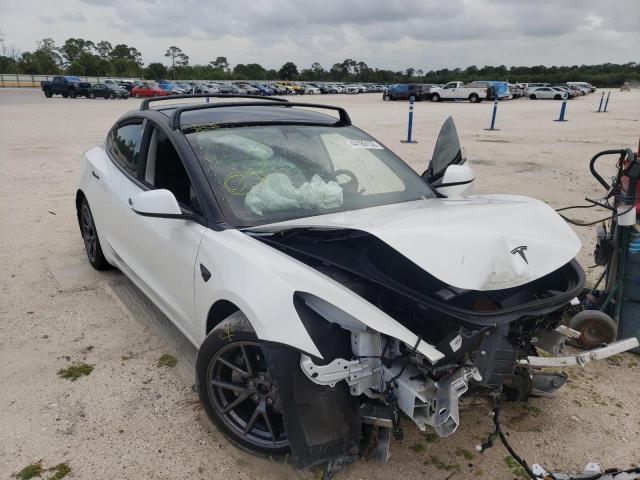TESLA MODEL 3 2021 with VIN 5YJ3E1EB9MF974324 - Photo from auction