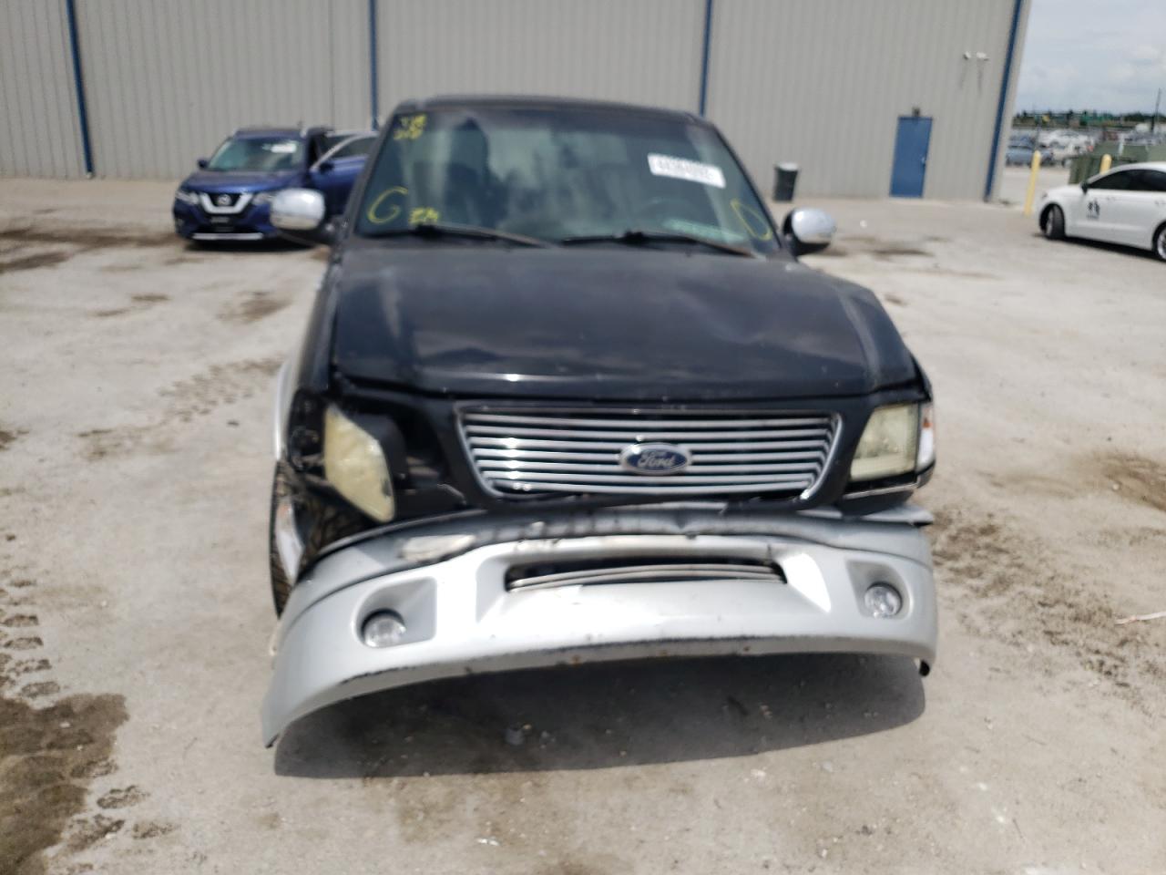 Photo 9 from auction – 2003 FORD F150 SUPER with VIN 1FTRW07363KD70805