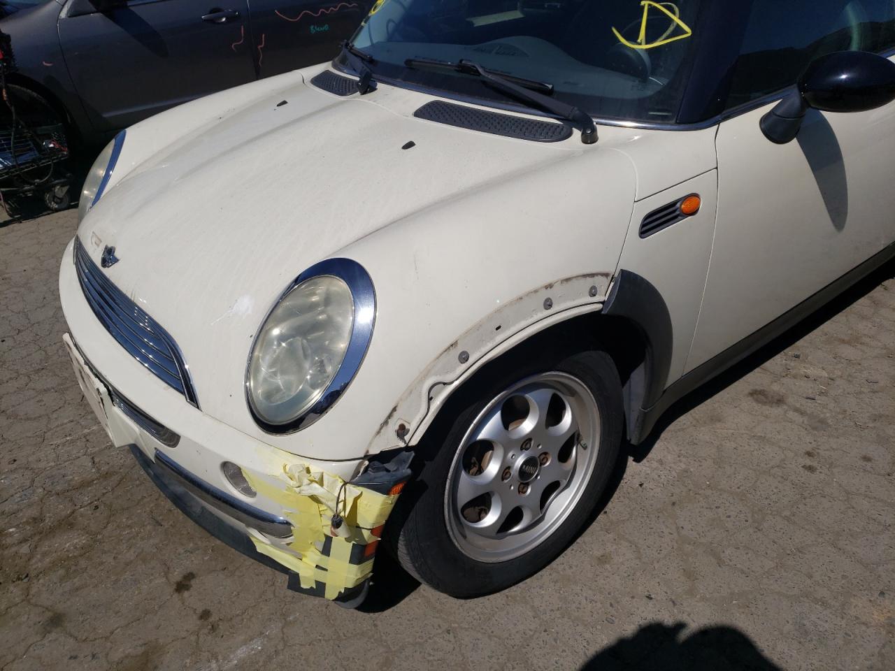 Photo 9 from auction – 2004 MINI COOPER with VIN WMWRC33414TJ55558