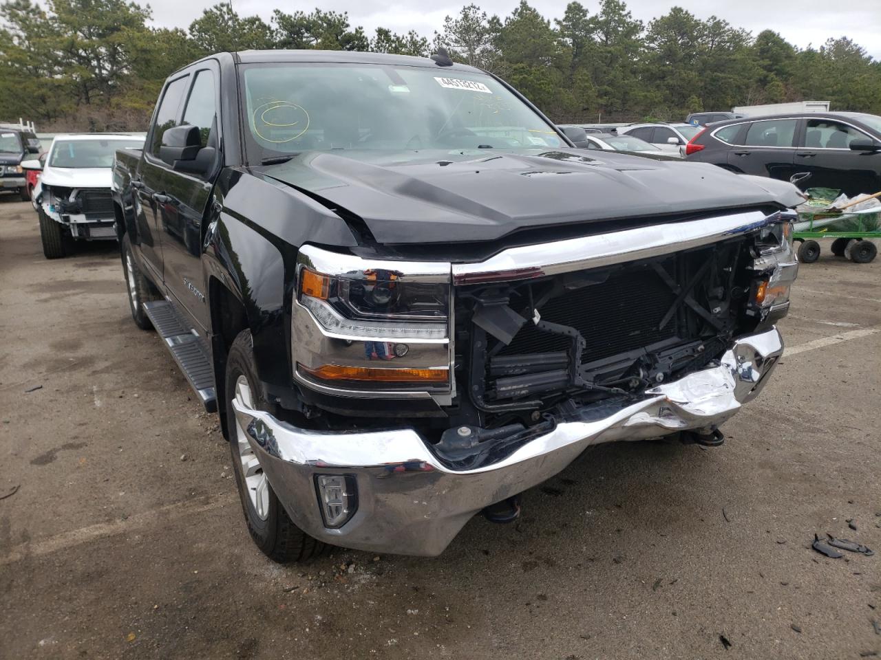 CHEVROLET SILVERADO 2018 with VIN 3GCUKREC7JG323171 - Photo from auction