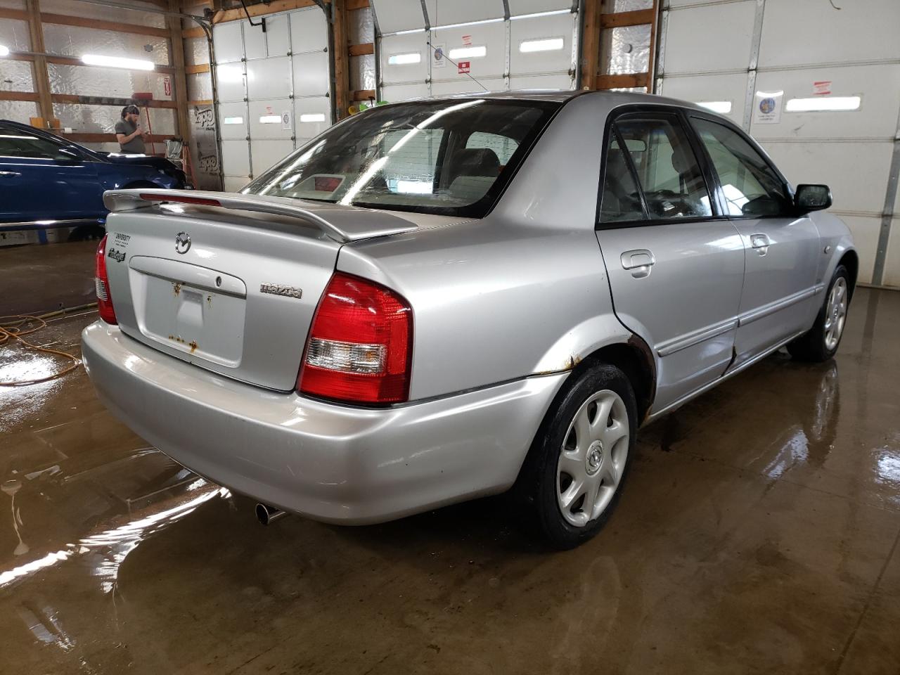 Photo 4 from auction – 2002 MAZDA PROTEGE DX with VIN JM1BJ225921605187