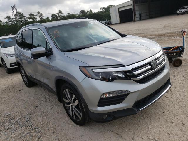 HONDA PILOT TOUR 2017 with VIN 5FNYF5H96HB008148 - Photo from auction