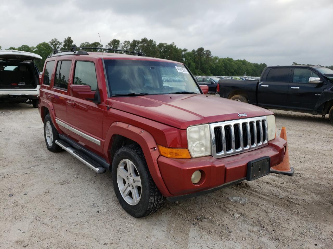JEEP COMMANDER 2010 with VIN 1J4RH5GT6AC122451 - Photo from auction