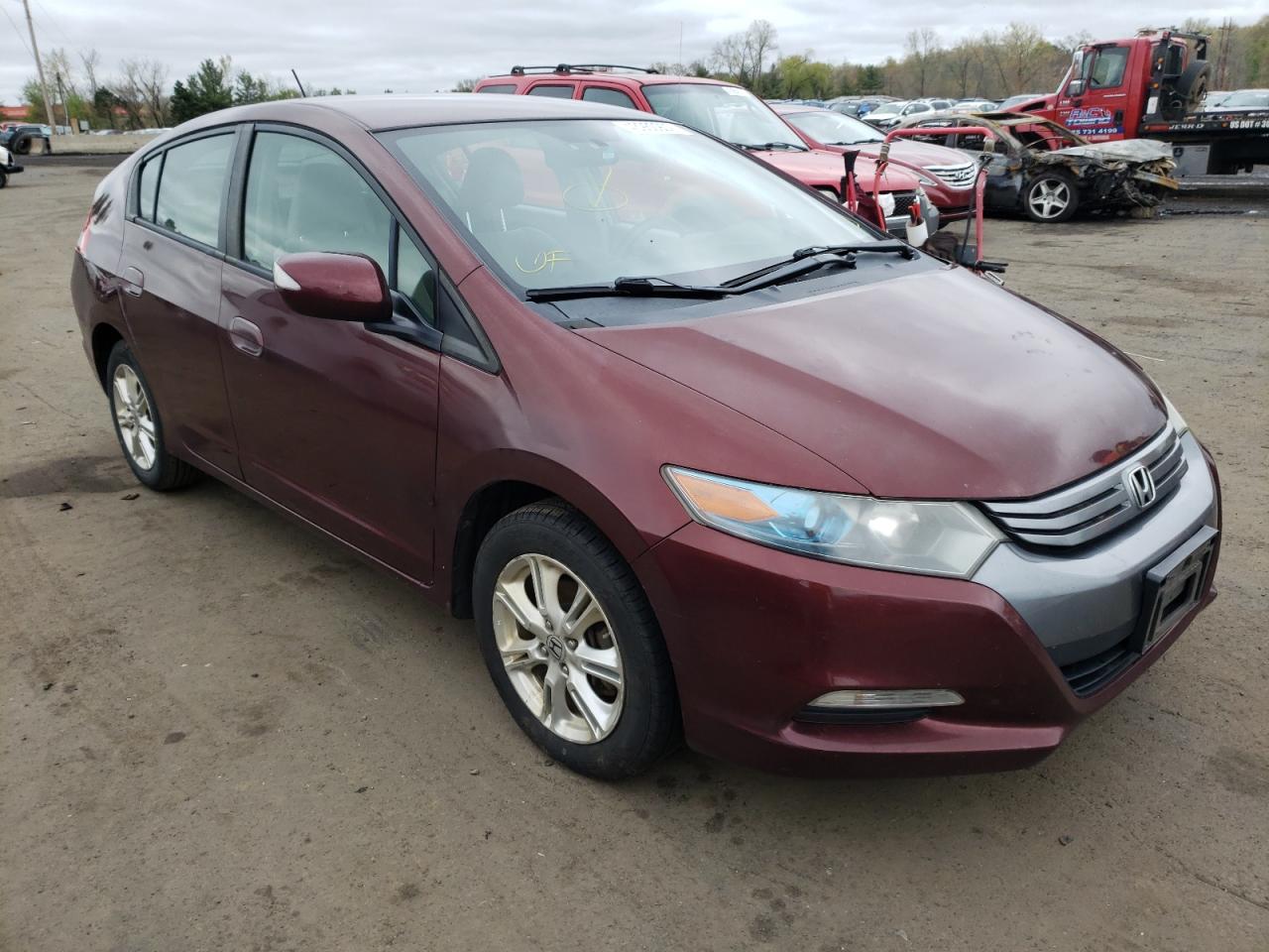 HONDA INSIGHT 2011 with VIN JHMZE2H77BS009290 - Photo from auction