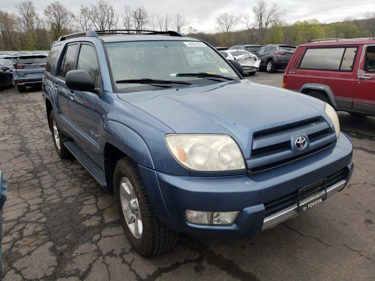 TOYOTA 4RUNNER SR 2003 with VIN JTEBU14R238008713 - Photo from auction