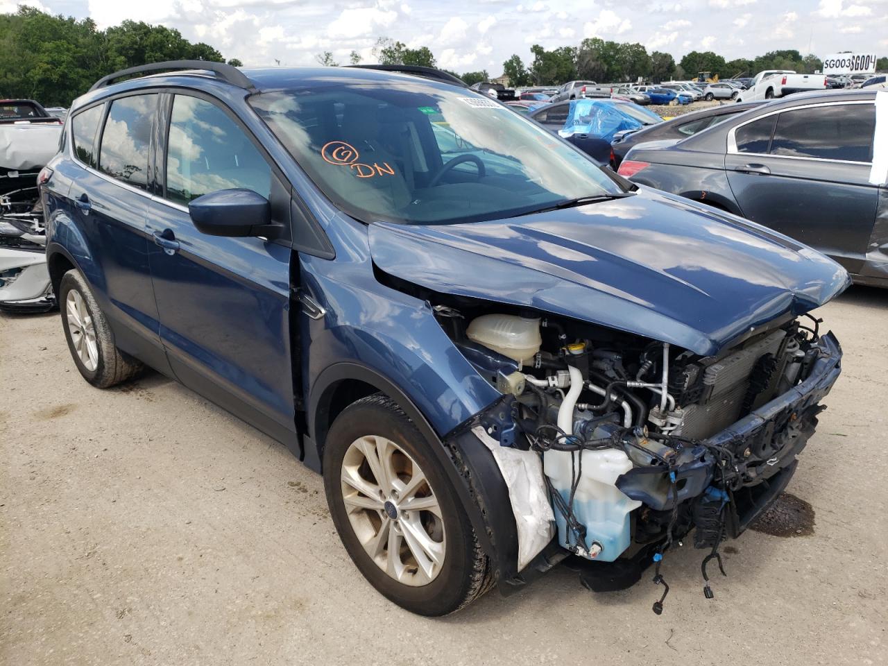 FORD ESCAPE SEL 2018 with VIN 1FMCU0HD5JUA70608 - Photo from auction