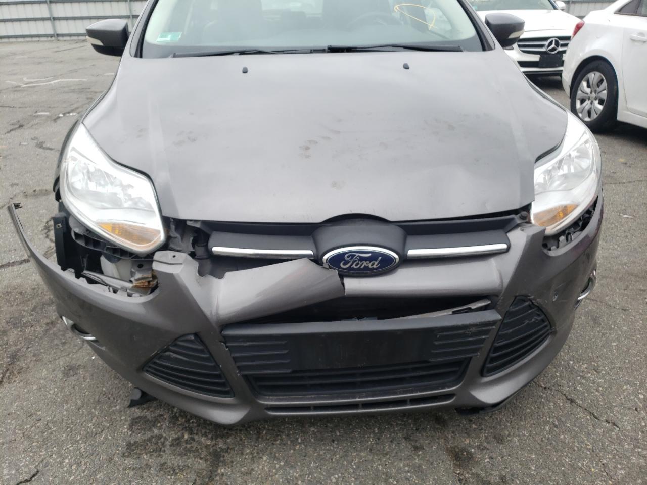 Photo 9 from auction – 2014 FORD FOCUS SE with VIN 1FADP3K28EL114143