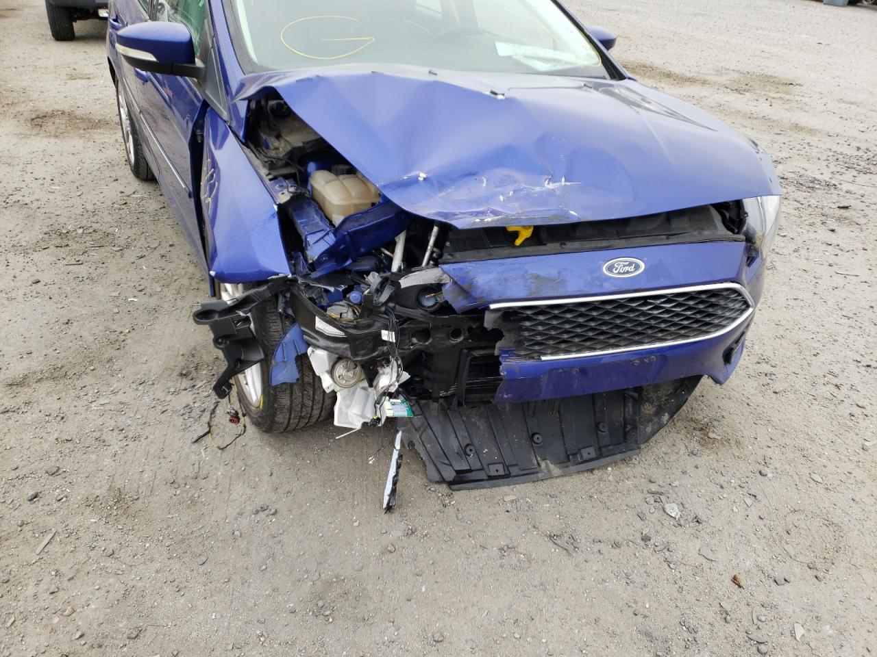 Photo 9 from auction – 2015 FORD FOCUS SE with VIN 1FADP3F25FL372924