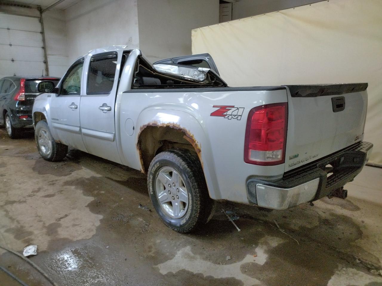 Photo 3 from auction – 2010 GMC SIERRA K15 with VIN 3GTRKWE33AG107984