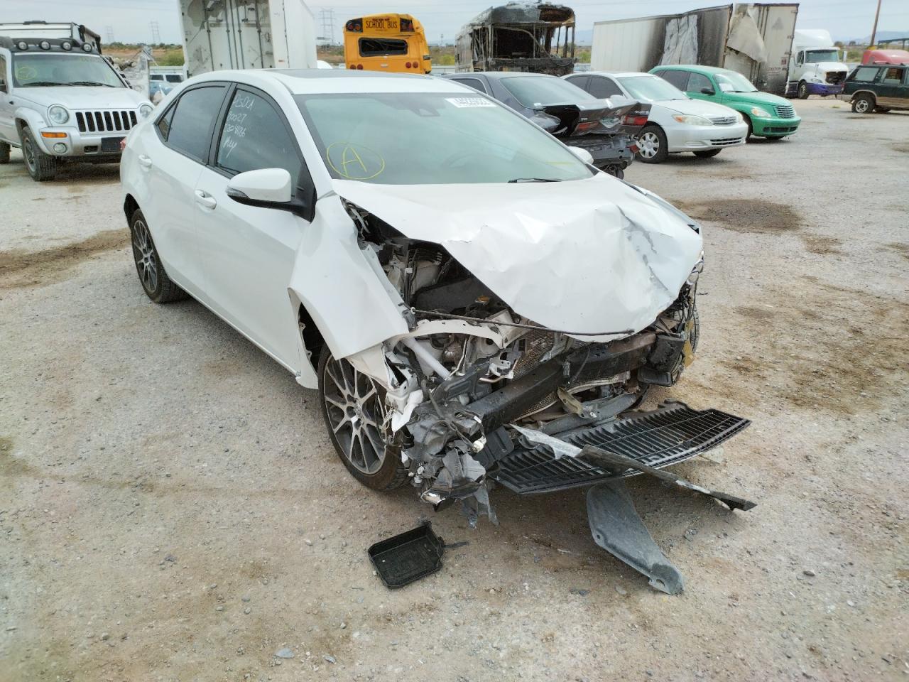 Photo 11 from auction – 2017 TOYOTA COROLLA with VIN 5YFBURHE0HP581504