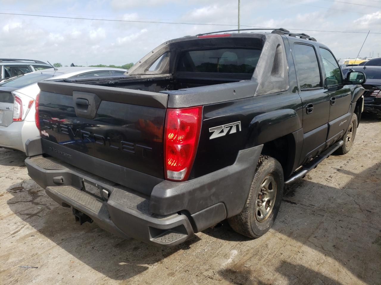 Photo 17 from auction – 2003 CHEVROLET AVALANCHE with VIN 3GNEK13TX3G141323