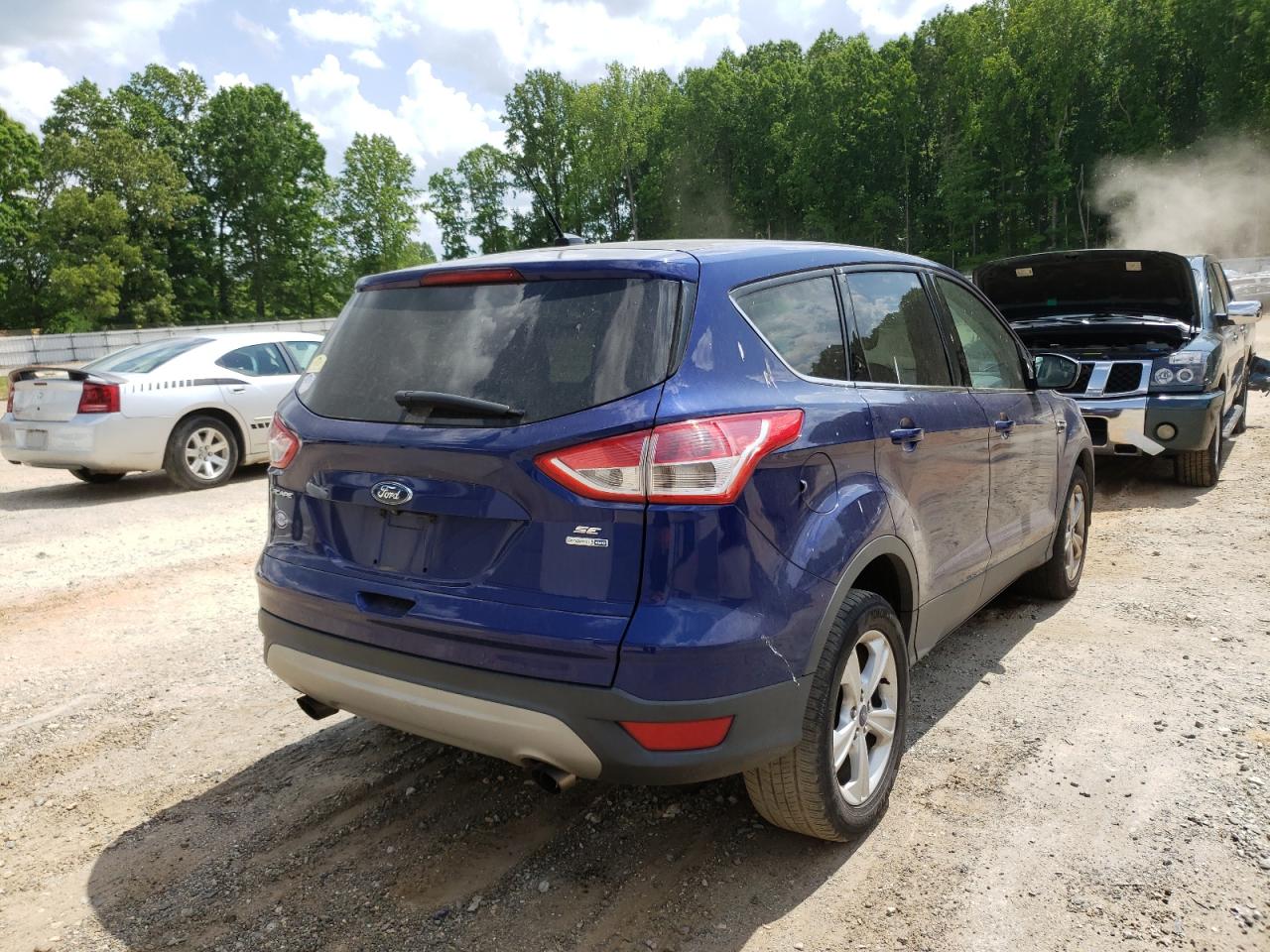 Photo 4 from auction – 2014 FORD ESCAPE SE with VIN 1FMCU9GX3EUD92251
