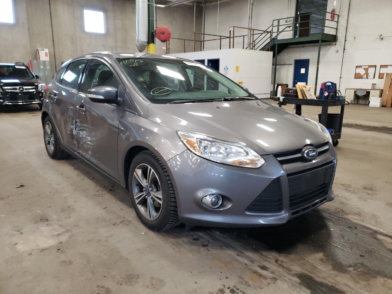 FORD FOCUS SE 2014 with VIN 1FADP3K2XEL463577 - Photo from auction