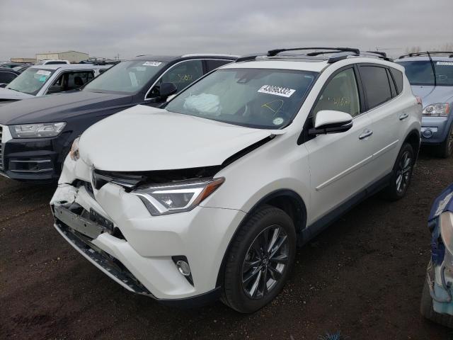 Photo 2 from auction – 2018 TOYOTA RAV4 LIMIT with VIN JTMDFREV2JJ727693