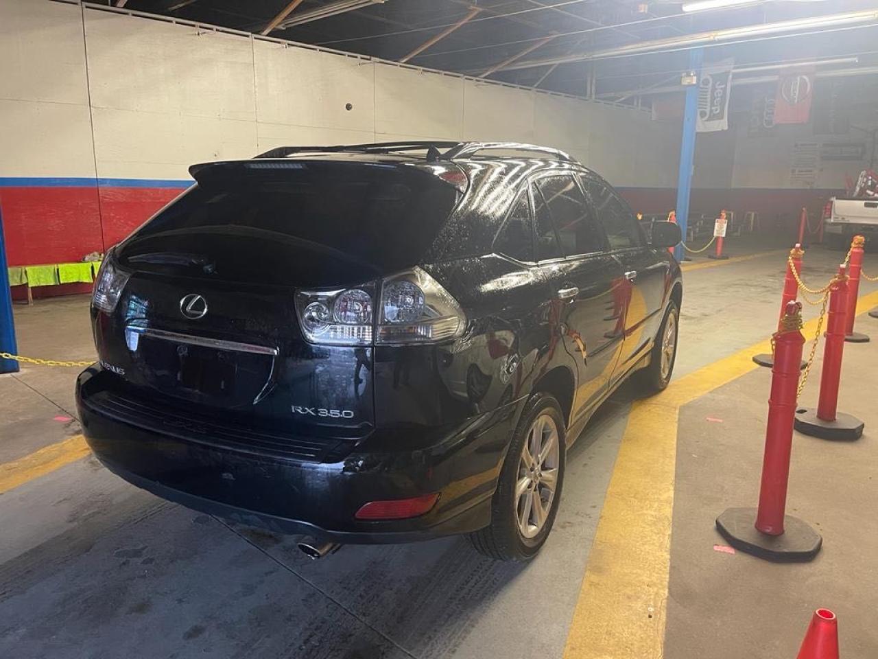 Photo 4 from auction – 2009 LEXUS RX 350 with VIN 2T2GK31U19C061528