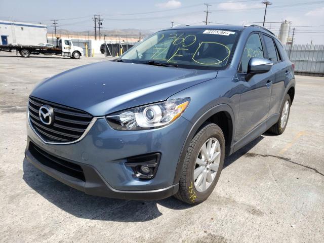 Photo 2 from auction – 2016 MAZDA CX-5 TOURI with VIN JM3KE2CYXG0737778