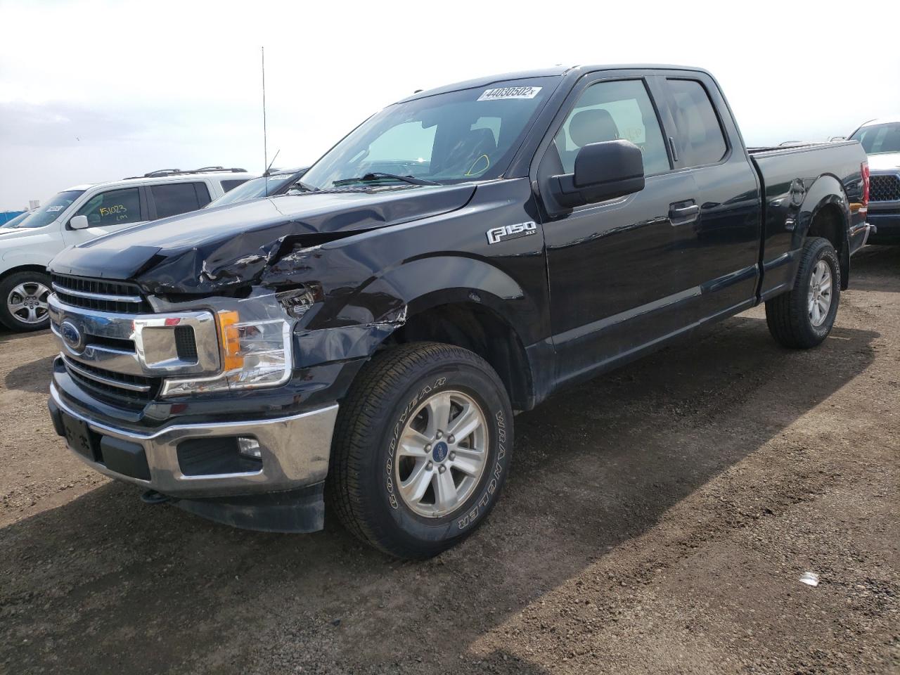 Photo 14 from auction – 2018 FORD F150 SUPER with VIN 1FTFX1E57JKE73545
