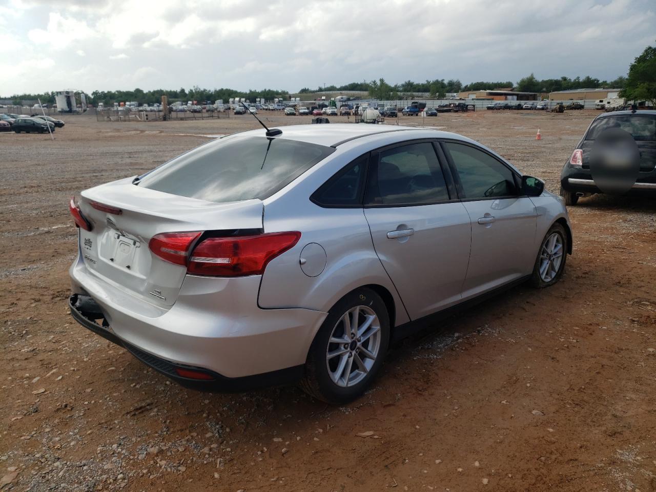 Photo 4 from auction – 2016 FORD FOCUS with VIN 1FADP3F2XGL395147