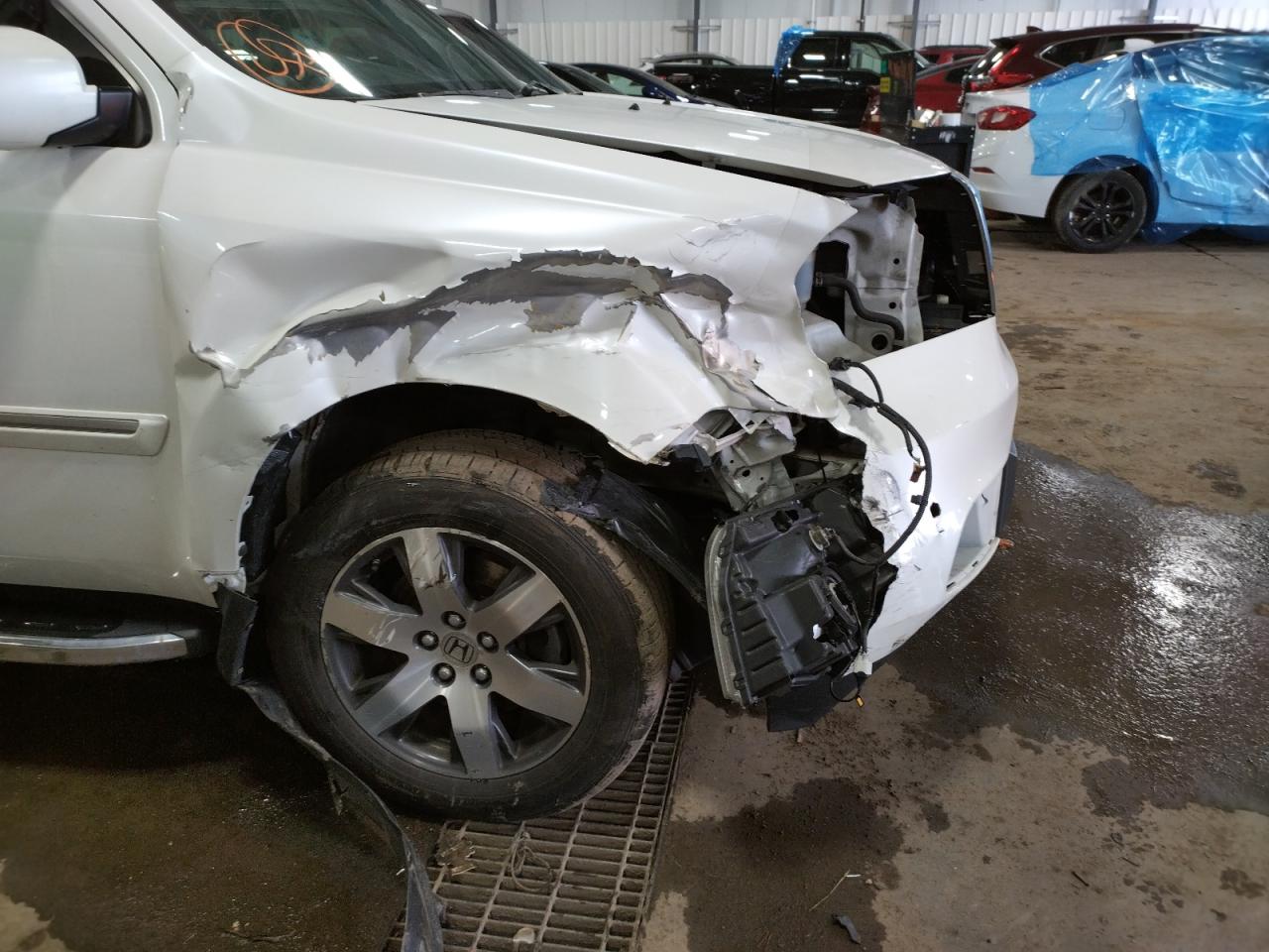 Photo 9 from auction – 2012 HONDA PILOT TOUR with VIN 5FNYF4H93CB064230