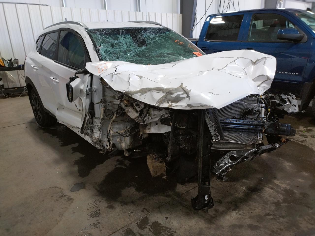 Photo 1 from auction – 2020 HYUNDAI TUCSON LIM with VIN KM8J3CA42LU101094