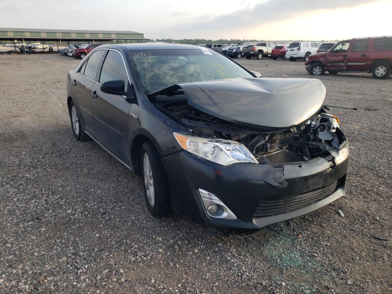 TOYOTA CAMRY HYBR 2012 with VIN 4T1BD1FKXCU033818 - Photo from auction