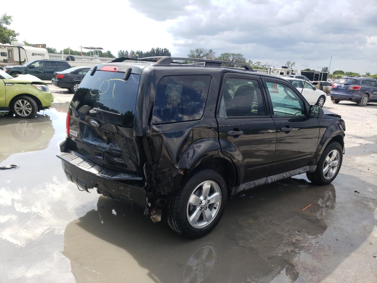 Photo 4 from auction – 2011 FORD ESCAPE XLT with VIN 1FMCU0DG8BKB70487