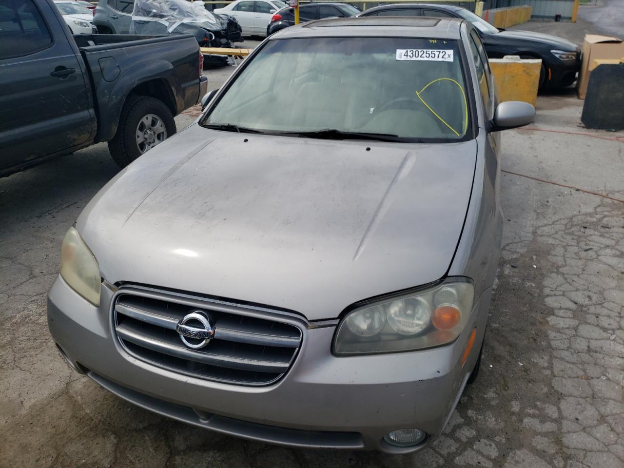 Photo 9 from auction – 2003 NISSAN MAXIMA GLE with VIN JN1DA31A83T407206