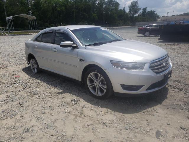 FORD TAURUS SEL 2013 with VIN 1FAHP2E80DG163839 - Photo from auction