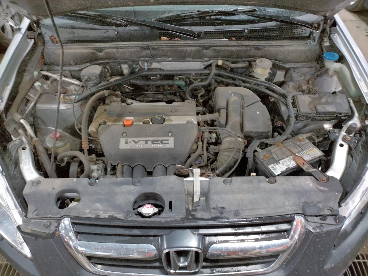 Photo 7 from auction – 2004 HONDA CR-V LX with VIN JHLRD684X4C019748