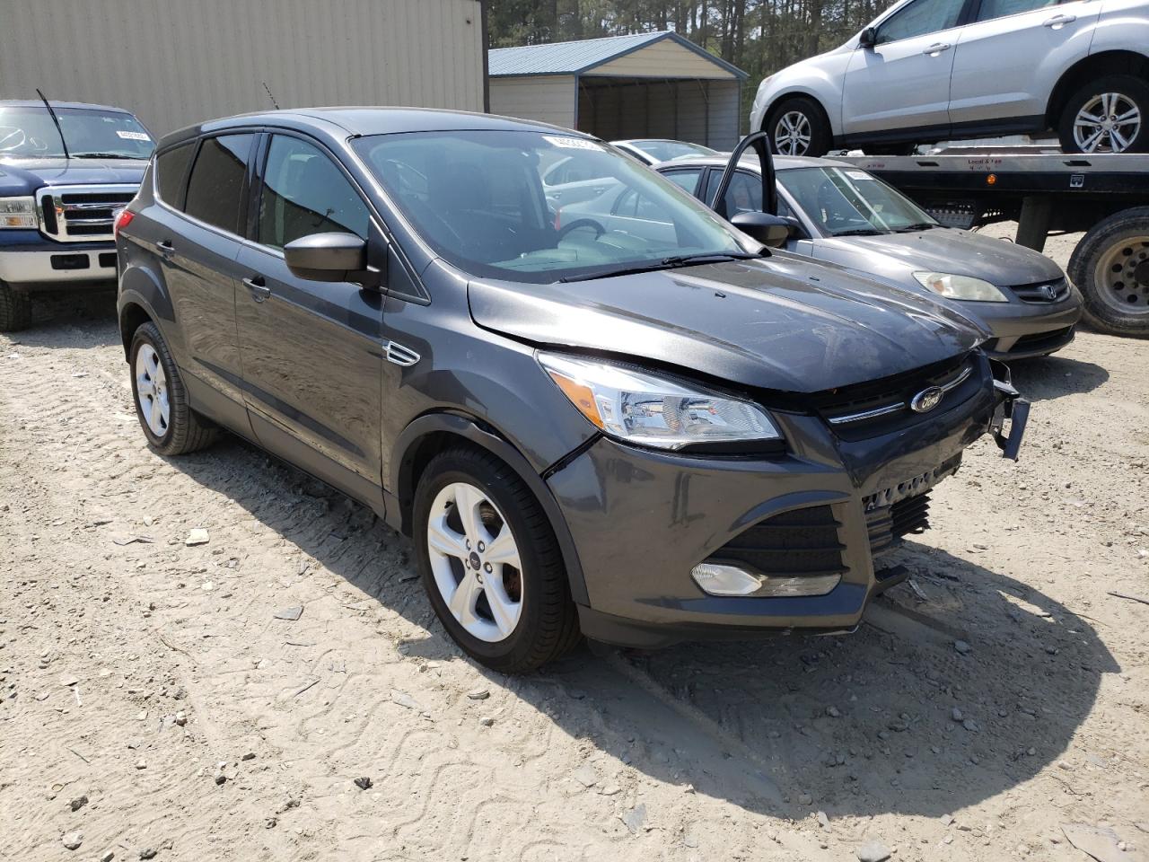 FORD ESCAPE SE 2015 with VIN 1FMCU0GX4FUA49557 - Photo from auction