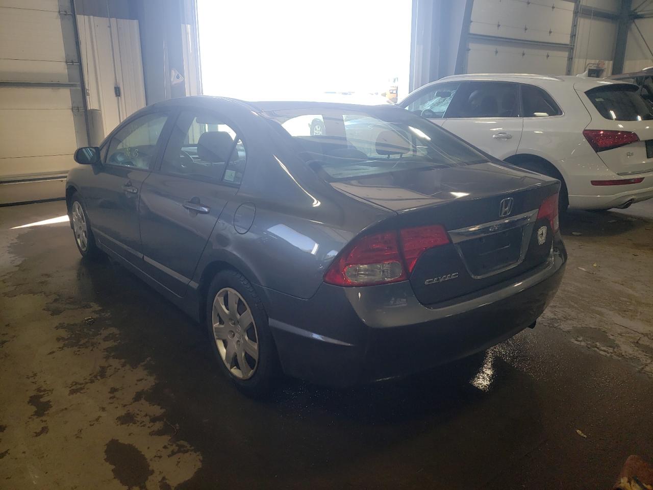 Photo 3 from auction – 2010 HONDA CIVIC LX with VIN 19XFA1F50AE001898