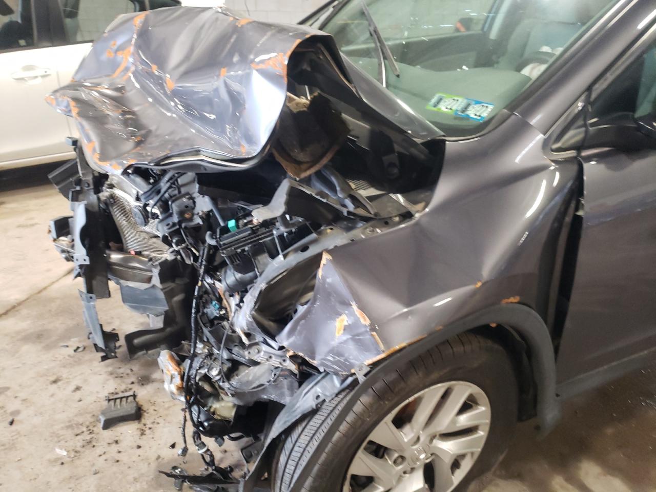 Photo 9 from auction – 2016 HONDA CR-V EX with VIN 2HKRM4H58GH728472