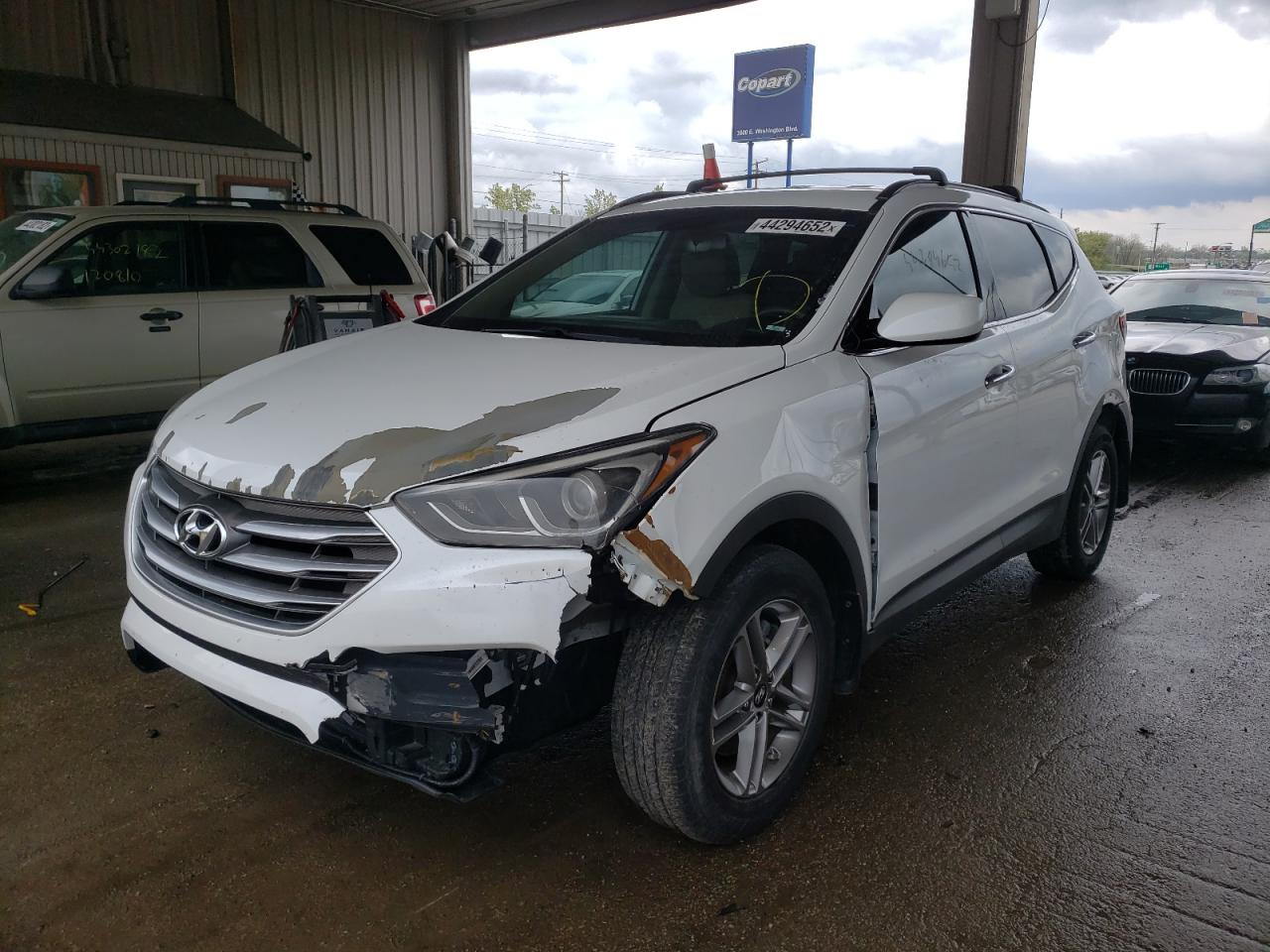 Photo 2 from auction – 2017 HYUNDAI SANTA FE S with VIN 5NMZU3LB8HH034337
