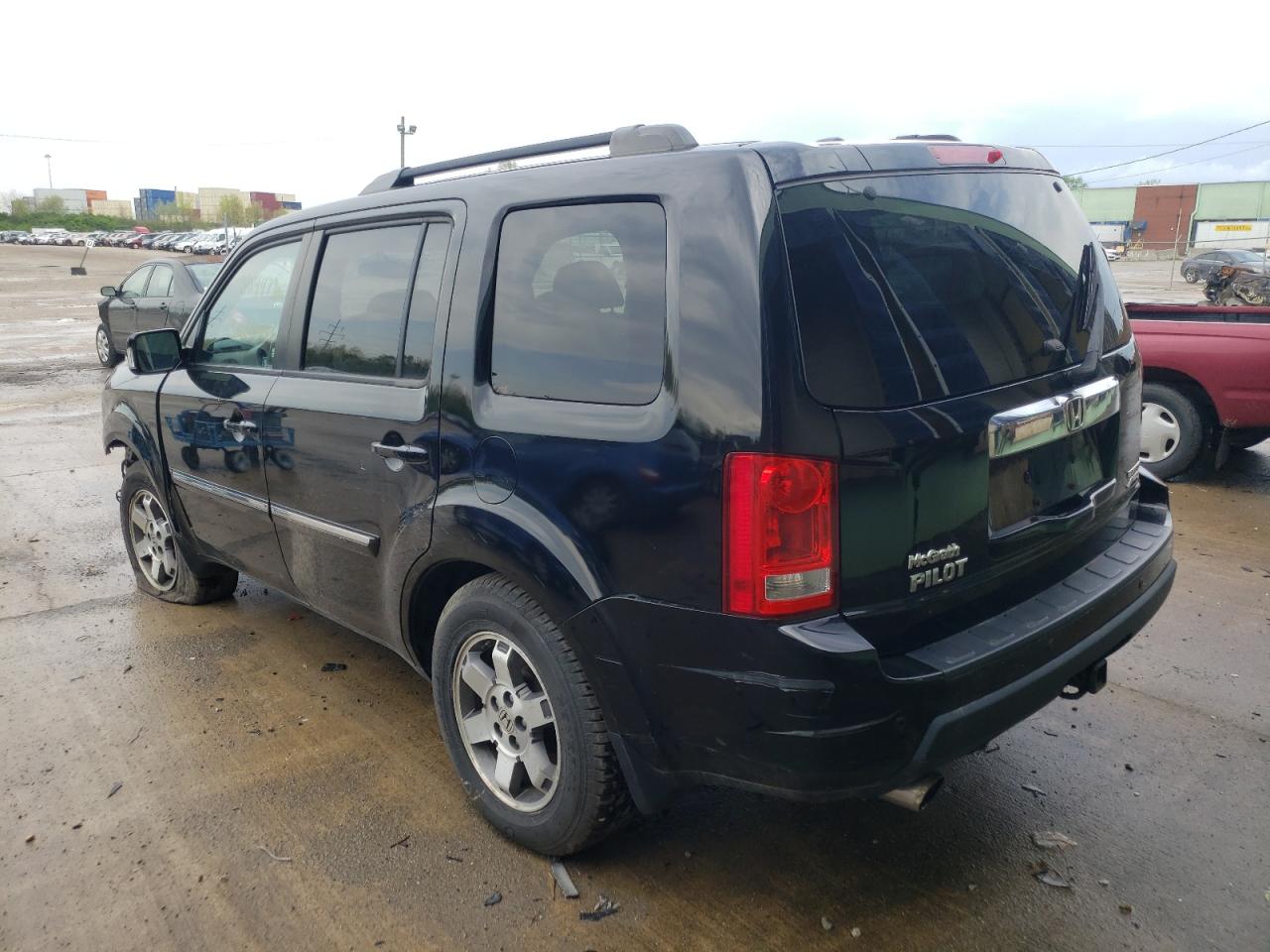 Photo 3 from auction – 2011 HONDA PILOT TOUR with VIN 5FNYF4H90BB058190