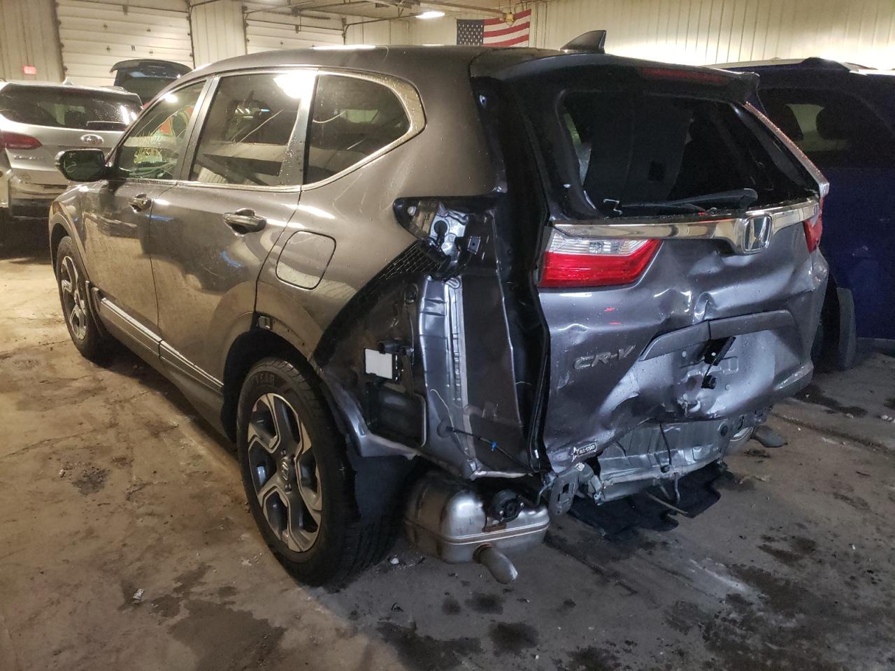 Photo 3 from auction – 2017 HONDA CR-V EXL with VIN 7FARW1H83HE003630