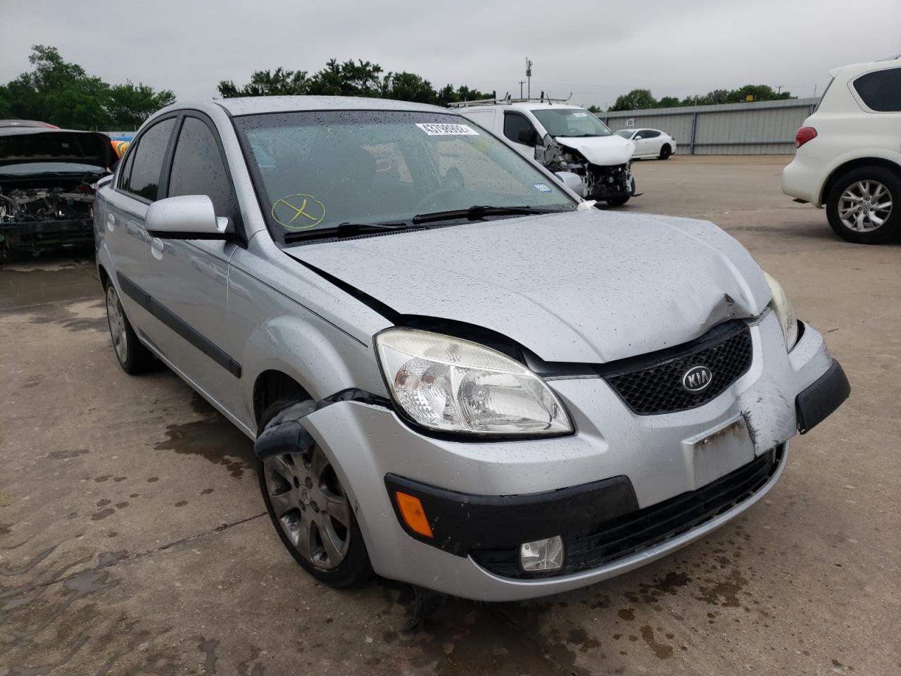KIA RIO BASE 2009 with VIN KNADE223196469112 - Photo from auction
