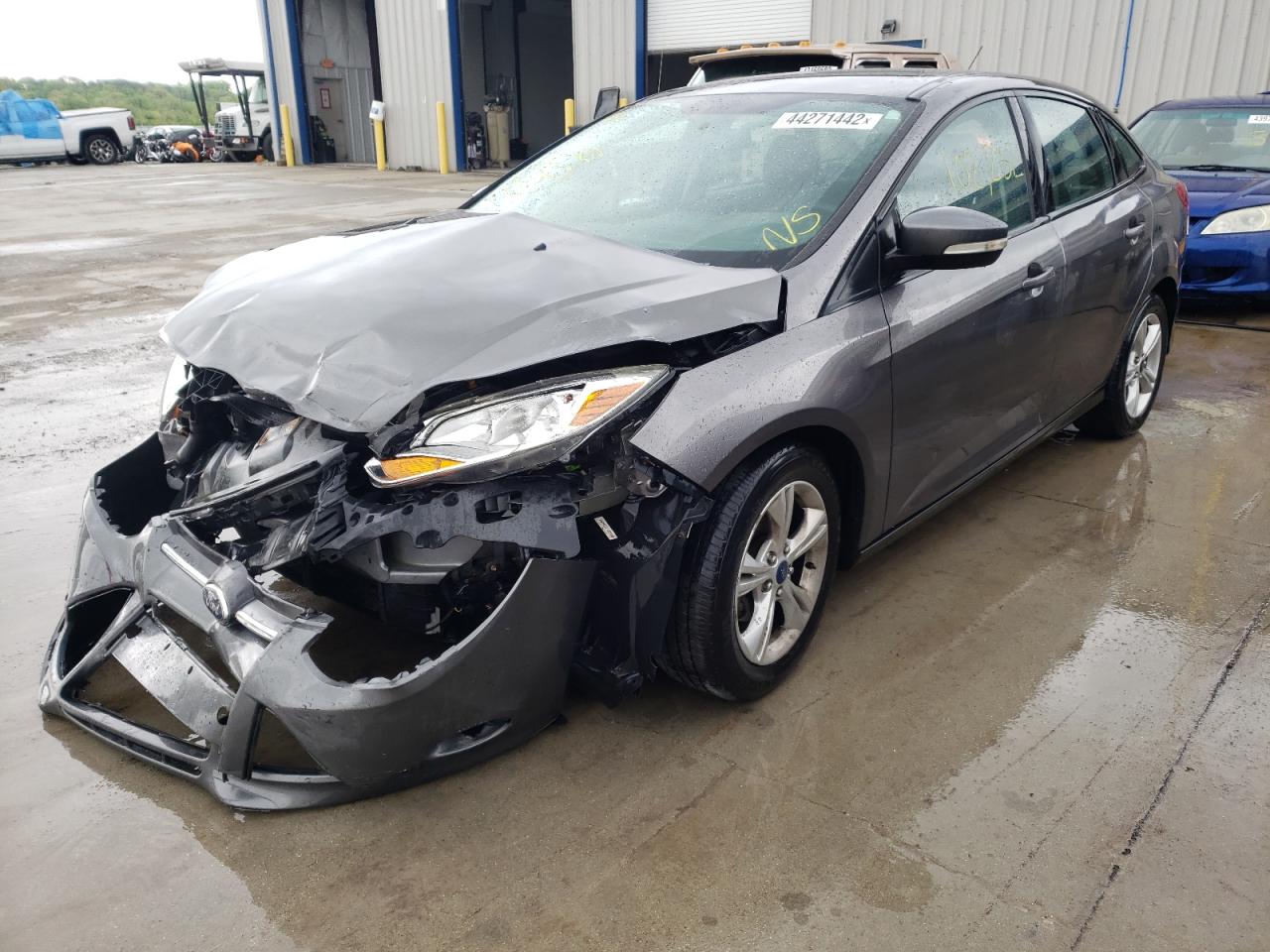 Фото 2 с аукциона – 2014 FORD FOCUS SE с VIN 1FADP3F25EL405418