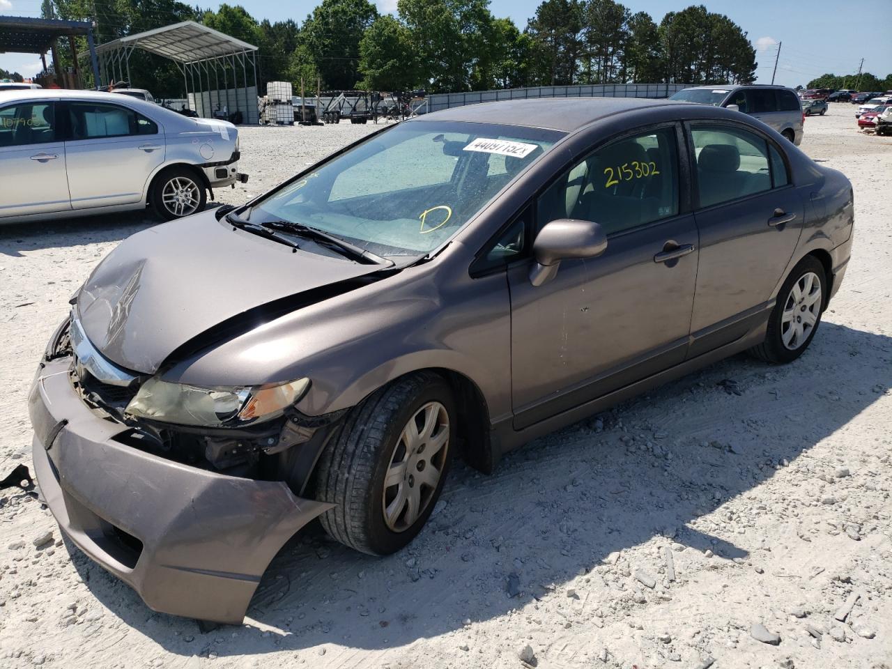 Photo 2 from auction – 2010 HONDA CIVIC LX with VIN 2HGFA1F51AH557773