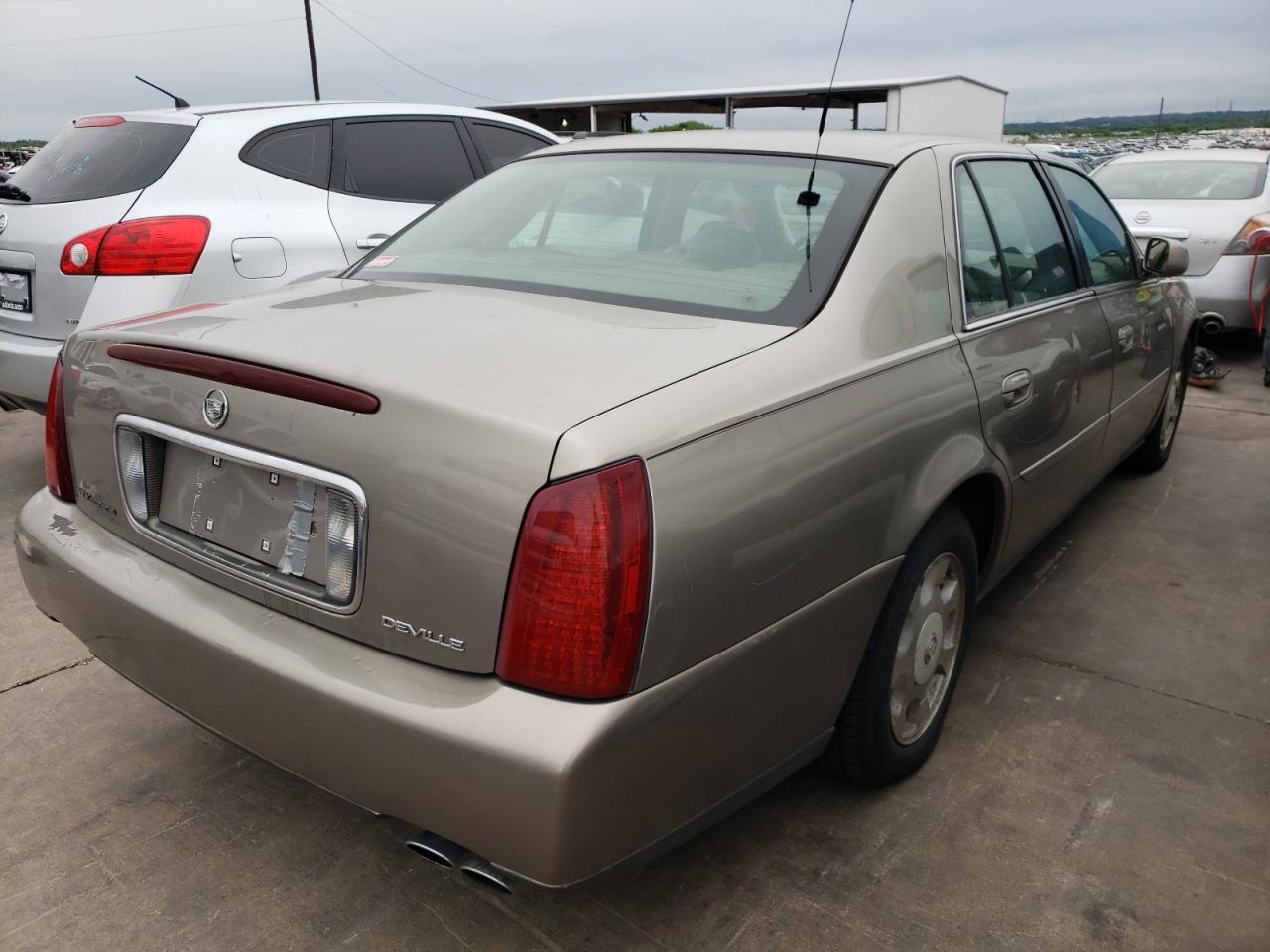 Photo 4 from auction – 2002 CADILLAC DEVILLE with VIN 1G6KD54Y52U202583