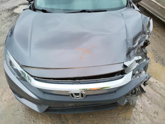 Photo 7 from auction – 2018 HONDA CIVIC EX with VIN 19XFC1E31JE003248