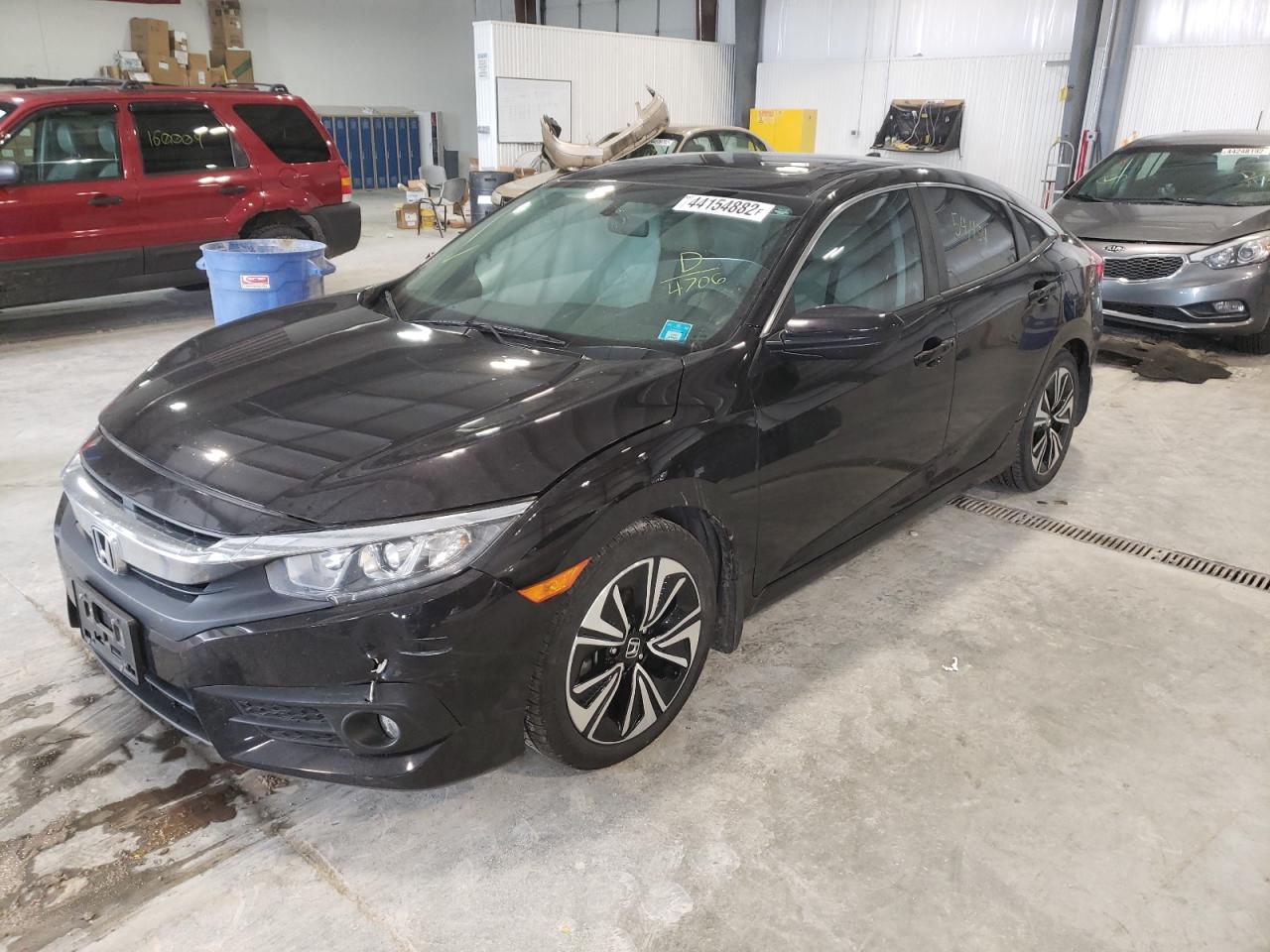 Photo 15 from auction – 2016 HONDA CIVIC EX with VIN 2HGFC1F33GH644706