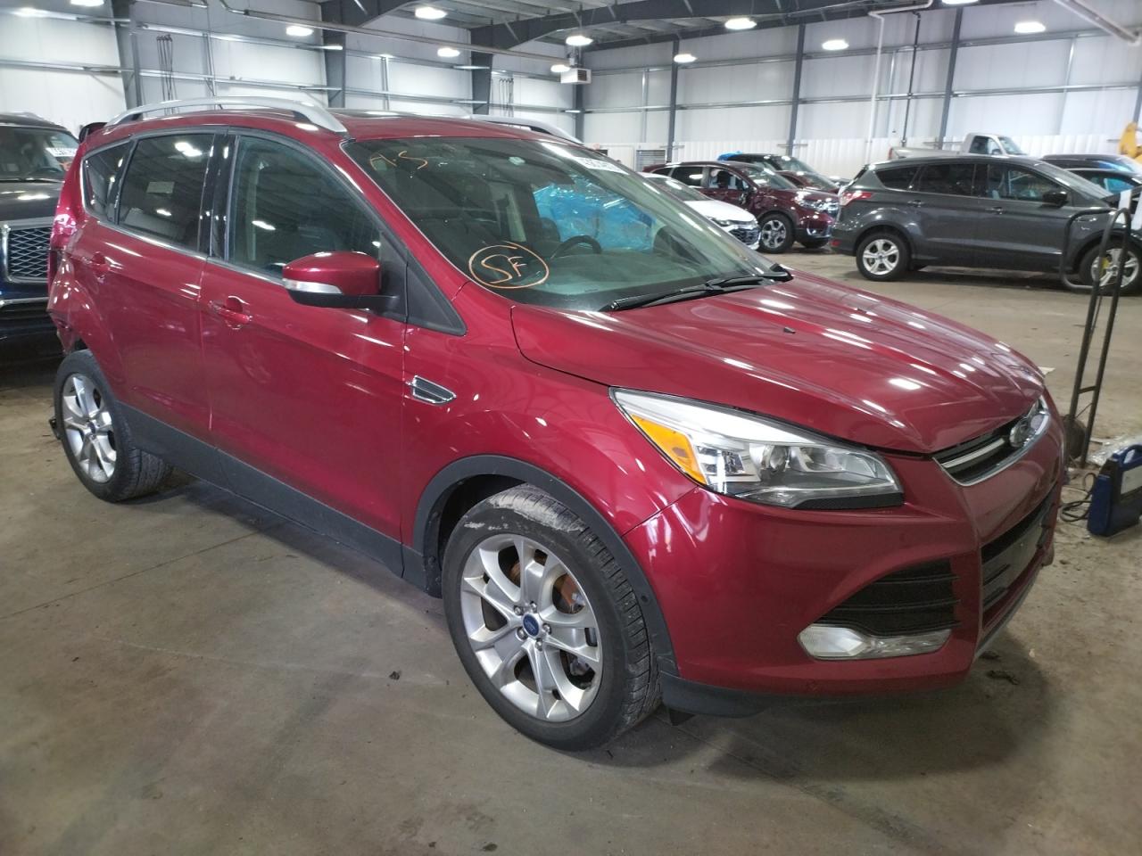 FORD ESCAPE TIT 2014 with VIN 1FMCU0J91EUC59879 - Photo from auction